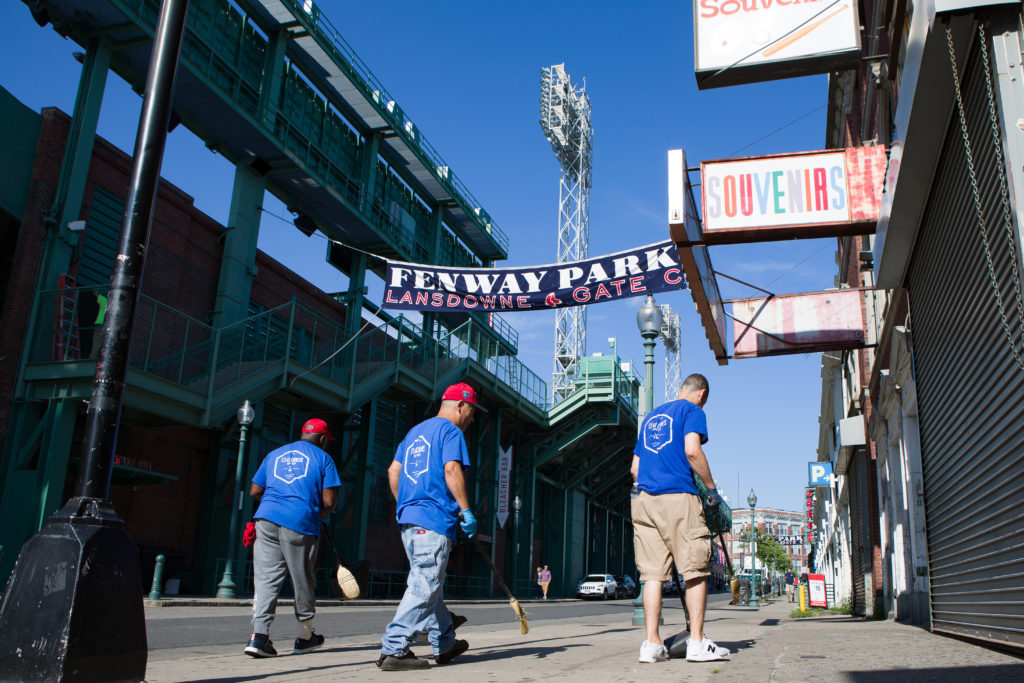 3 clean corners employees sweeping the streets in Fenway
