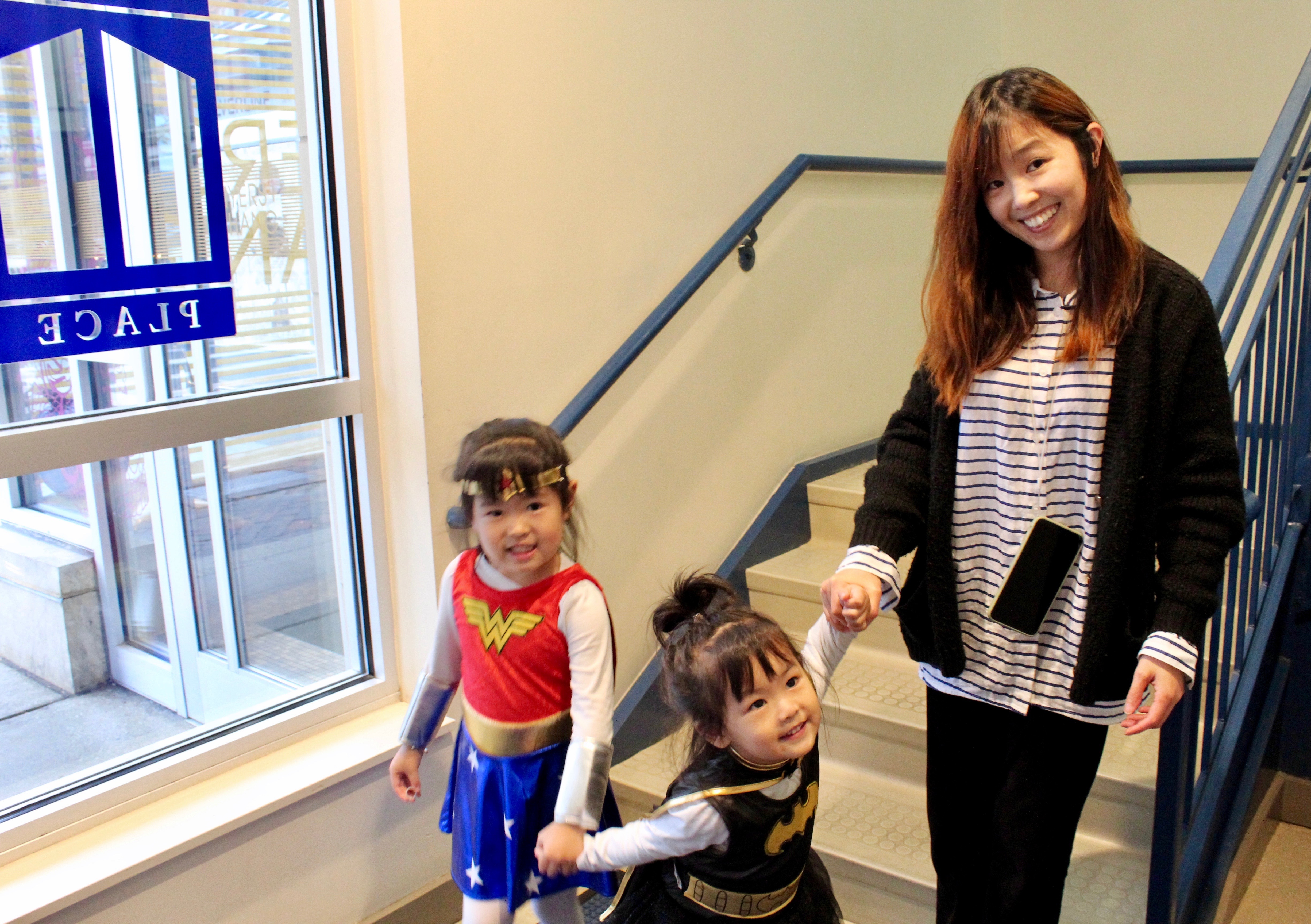 a woman and her two daughters in costumes at Project Place's halloween event